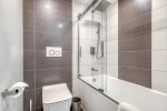Master Bathroom features Shower and Bathtub double Vanities 